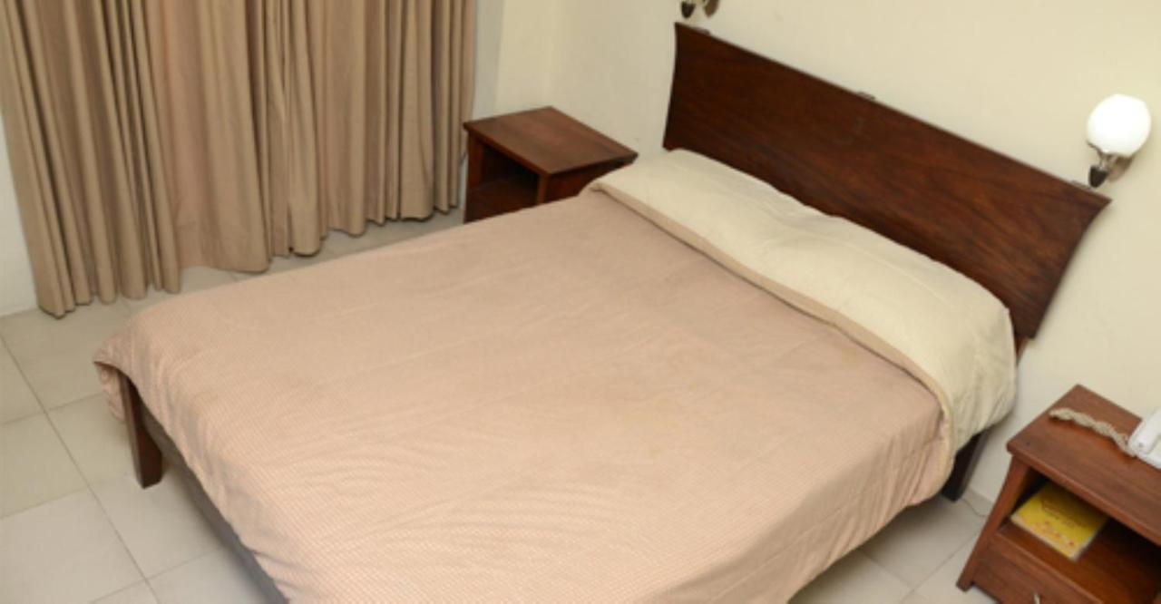 Isabel Suites Laoag Δωμάτιο φωτογραφία